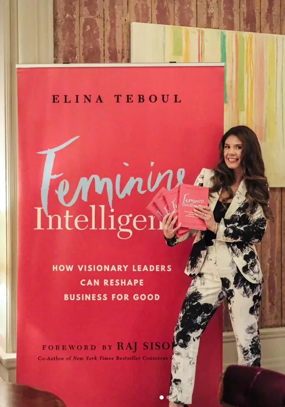 Client with her book Feminine Intelligence