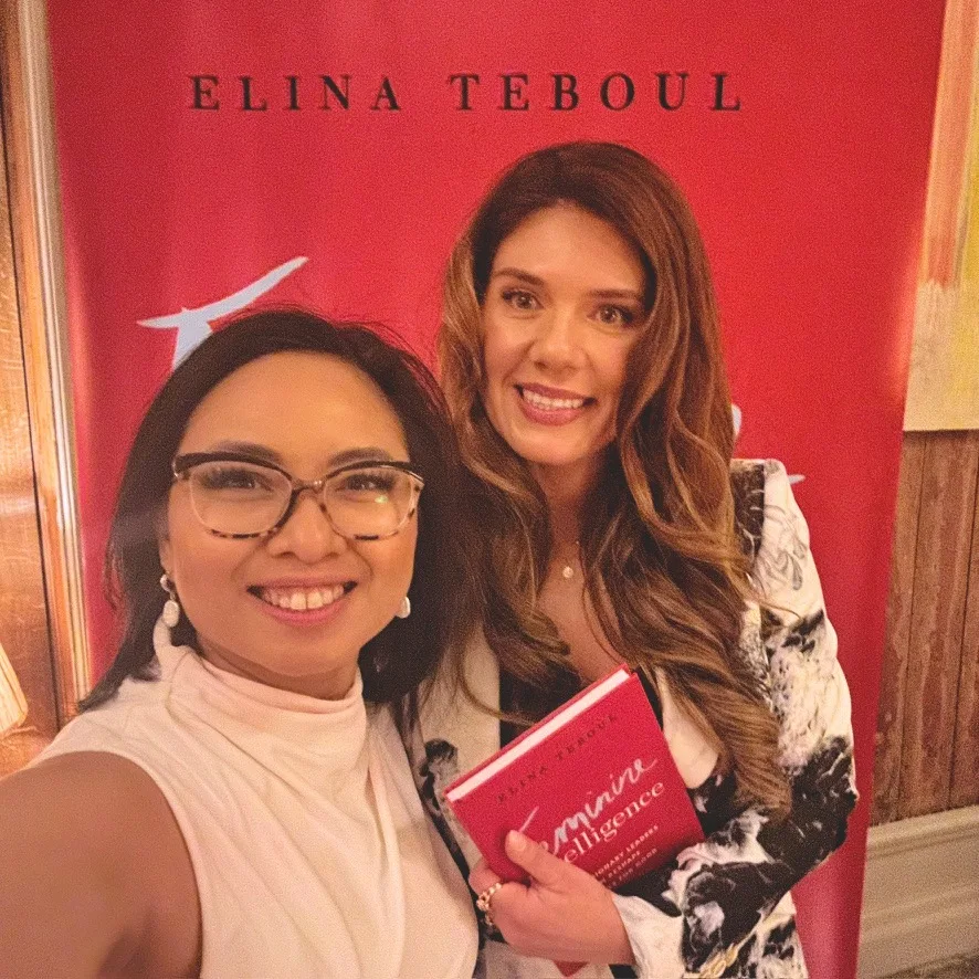 Elina Teboul and a reader holding Feminine Intelligence